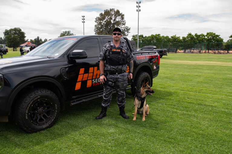 Hi Zone Security team member with response vehicle and trained security dog in Alberton, Gauteng